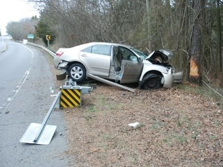 2 Hospitalized After Car Hits Guardrail, Tree In Manchester