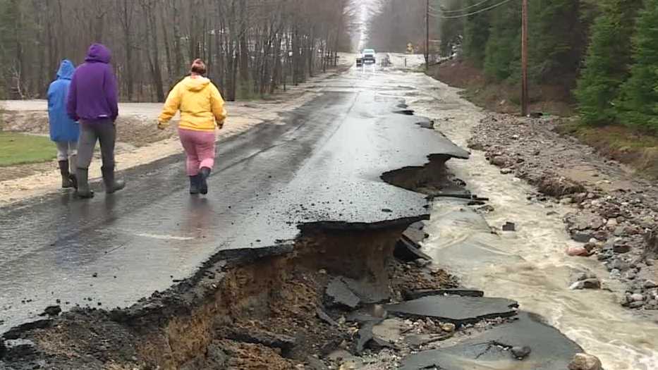 Maine, NH flooding damages roadways, takes down tree limbs
